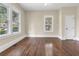 Bright living room featuring hardwood floors and large windows at 776 Brookline Sw St, Atlanta, GA 30310