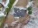 House with a gray roof, snowy yard at 7801 Windswept Way, Douglasville, GA 30135