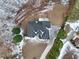 Aerial view of house with snow covered yard at 7801 Windswept Way, Douglasville, GA 30135