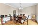 Formal dining room with hardwood floors at 7801 Windswept Way, Douglasville, GA 30135