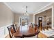 Formal dining room with hardwood floors at 7801 Windswept Way, Douglasville, GA 30135