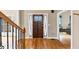 Hardwood floors and a view of the staircase at 7801 Windswept Way, Douglasville, GA 30135