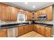 Modern kitchen with granite countertops and gas cooktop at 7801 Windswept Way, Douglasville, GA 30135