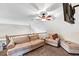 Comfortable loft sitting area with ceiling fan at 7801 Windswept Way, Douglasville, GA 30135