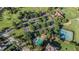 Aerial view of community with pool, tennis courts, and clubhouse at 928 Buckhorn Bnd, Locust Grove, GA 30248