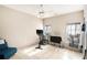 Bright bedroom with exercise equipment and plenty of natural light at 928 Buckhorn Bnd, Locust Grove, GA 30248