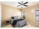 Charming bedroom with a double bed and nightstand at 928 Buckhorn Bnd, Locust Grove, GA 30248