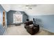 Large bonus room with a recliner and home office at 928 Buckhorn Bnd, Locust Grove, GA 30248