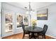 Bright dining area with hardwood floors and access to patio at 928 Buckhorn Bnd, Locust Grove, GA 30248