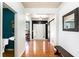 Hardwood floors, half bath, and barn door entry at 928 Buckhorn Bnd, Locust Grove, GA 30248