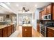 Spacious kitchen with island, stainless steel appliances, and granite countertops at 928 Buckhorn Bnd, Locust Grove, GA 30248