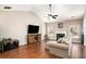 Vaulted ceiling, hardwood floors, and fireplace at 928 Buckhorn Bnd, Locust Grove, GA 30248