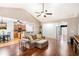 Open living space with hardwood floors and kitchen view at 928 Buckhorn Bnd, Locust Grove, GA 30248