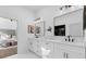 Modern bathroom with double vanity, large mirror, and a stylish design at 2438 2Nd Nw St, Atlanta, GA 30318