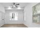 Bright bedroom with hardwood floors and large windows at 2438 2Nd Nw St, Atlanta, GA 30318