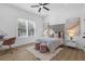 Bright bedroom with a queen bed, plush rug, and built-in workspace at 2438 2Nd Nw St, Atlanta, GA 30318