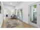 Light-filled hallway with access to balcony and other rooms at 2438 2Nd Nw St, Atlanta, GA 30318