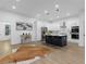 Modern kitchen with white cabinets, quartz countertops, and stainless steel appliances at 2438 2Nd Nw St, Atlanta, GA 30318