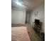 Bedroom with double door closet and neutral decor at 3006 Dogwood Dr, Hapeville, GA 30354