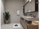 Spa-like bathroom with floating vanity and marble countertop at 639 Ozburn, Atlanta, GA 30318