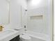 Modern bathroom features white marble tile and a sleek vanity at 639 Ozburn, Atlanta, GA 30318