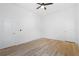Spacious bedroom with a ceiling fan and wood-look flooring offers a bright and airy feel at 639 Ozburn, Atlanta, GA 30318
