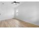 Bright bedroom features a ceiling fan, wood floors, and natural light from a window at 639 Ozburn, Atlanta, GA 30318