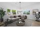 Bright living room featuring large windows and contemporary decor at 639 Ozburn, Atlanta, GA 30318