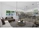 Modern living room with neutral tones, wood floors, and ample natural light at 639 Ozburn, Atlanta, GA 30318