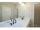 Bathroom with double vanity and modern black faucets at 2920 Ilir Nw Mnr, Atlanta, GA 30318