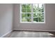 Bright bedroom with large window and neutral carpeting at 2920 Ilir Nw Mnr, Atlanta, GA 30318