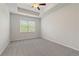 Bright bedroom with carpet and ceiling fan at 7004 Fringe Flower Dr # 86, Austell, GA 30168