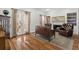 Cozy living room with hardwood floors, fireplace, and built-in shelves at 105 Jefferson Ne Cir, Atlanta, GA 30328