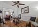 Bright home office with hardwood floors and built-in shelves at 105 Jefferson Ne Cir, Atlanta, GA 30328