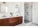 Elegant bathroom with double vanity, marble shower, and modern fixtures at 1870 Vigo Ne St, Atlanta, GA 30307