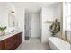 Spa-like bathroom with a soaking tub and walk-in shower at 1870 Vigo Ne St, Atlanta, GA 30307