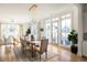 Dining room with wooden table and access to a deck at 1870 Vigo Ne St, Atlanta, GA 30307