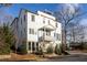 Modern white three-story home with a detached garage at 1870 Vigo Ne St, Atlanta, GA 30307