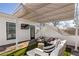 Relaxing rooftop deck features a pergola, seating area, and artificial turf at 1870 Vigo Ne St, Atlanta, GA 30307