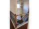 Elegant staircase with wrought iron balusters and hardwood at 416 Culloden Moor Dr, Mcdonough, GA 30253