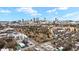 Expansive aerial view showcasing the Atlanta skyline with surrounding residential and commercial areas under a bright, partly cloudy sky at 563 Memorial Se Dr # 405, Atlanta, GA 30312