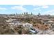 Bird's eye view capturing the urban landscape of Atlanta, highlighting residential buildings and the city skyline against a blue sky at 563 Memorial Se Dr # 405, Atlanta, GA 30312