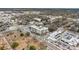 Areal view of residential building showcasing a modern architecture surrounded by a mature tree landscape and walkable roads at 563 Memorial Se Dr # 405, Atlanta, GA 30312