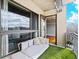 Private balcony with artificial turf and seating at 563 Memorial Se Dr # 405, Atlanta, GA 30312