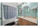 Modern bathroom with a shower/tub combo and granite vanity at 563 Memorial Se Dr # 405, Atlanta, GA 30312