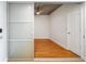 Bedroom space with hardwood floors and a sliding glass door at 563 Memorial Se Dr # 405, Atlanta, GA 30312