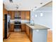 Modern kitchen with stainless steel appliances and granite island at 563 Memorial Se Dr # 405, Atlanta, GA 30312