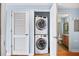 Stackable washer and dryer in a convenient laundry closet at 563 Memorial Se Dr # 405, Atlanta, GA 30312