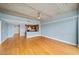 Open concept living area with hardwood floors and kitchen island at 563 Memorial Se Dr # 405, Atlanta, GA 30312