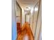 Long hallway with hardwood floors and neutral walls at 363 Seminole Ne Dr, Marietta, GA 30060